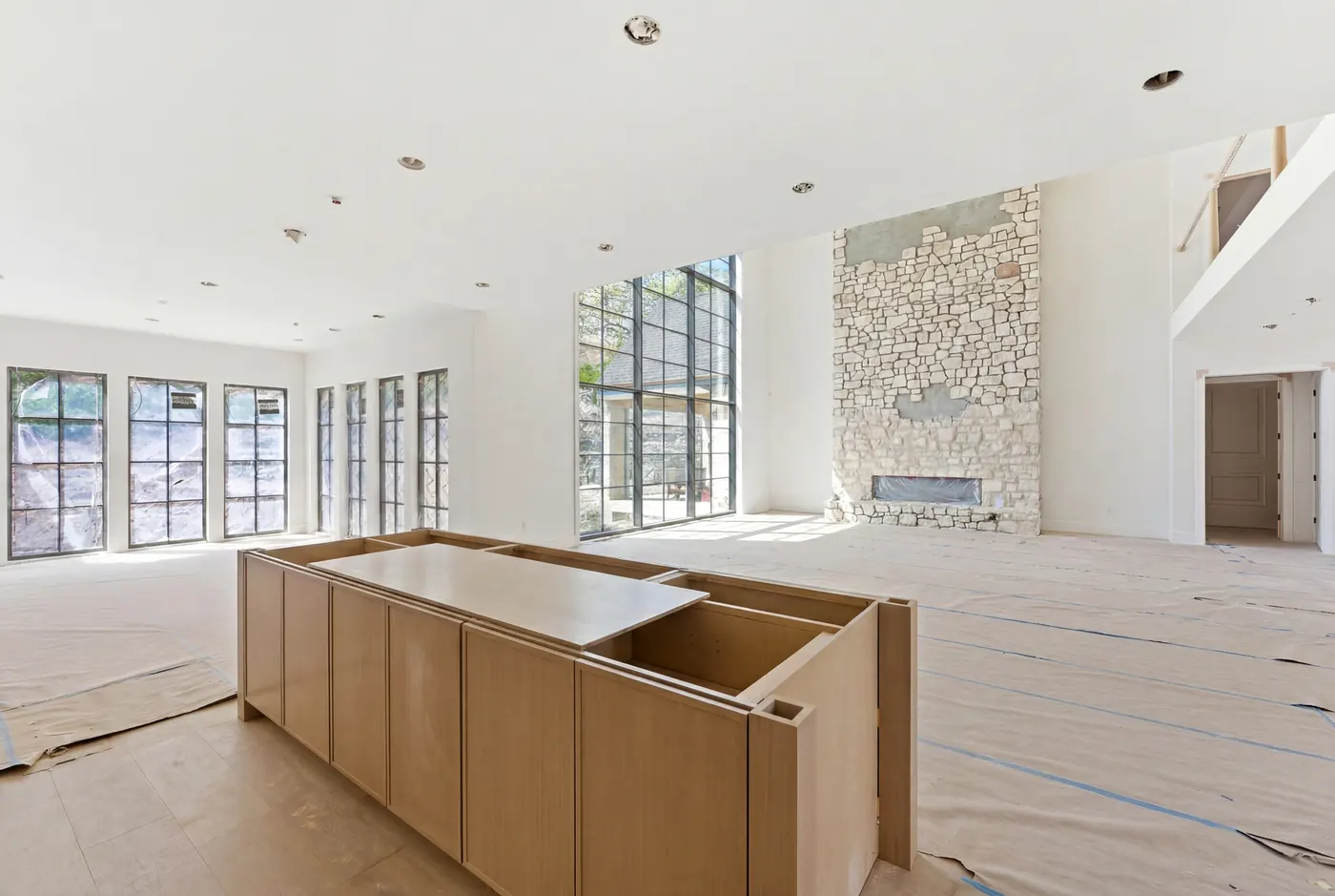 Chef's kitchen with island and window wall
