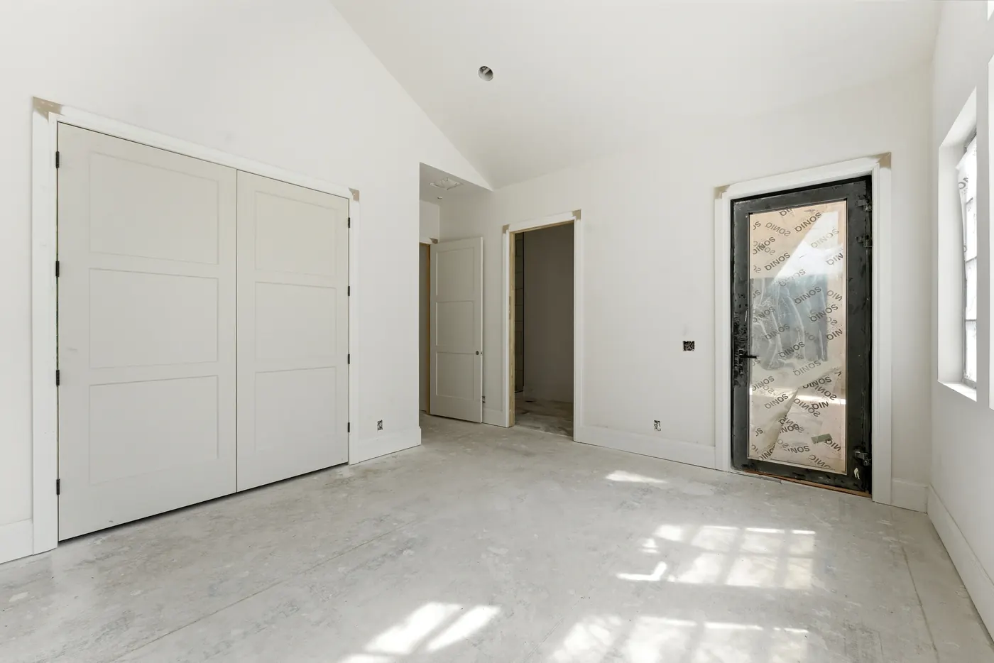Vaulted, light-filled primary suite
